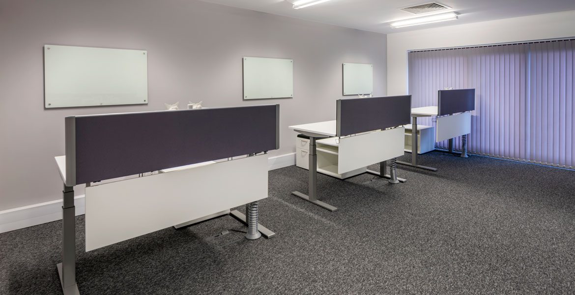 White office desking with blue desk screens