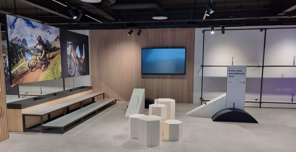 Acoustic panelled wall in commercial showroom fit out