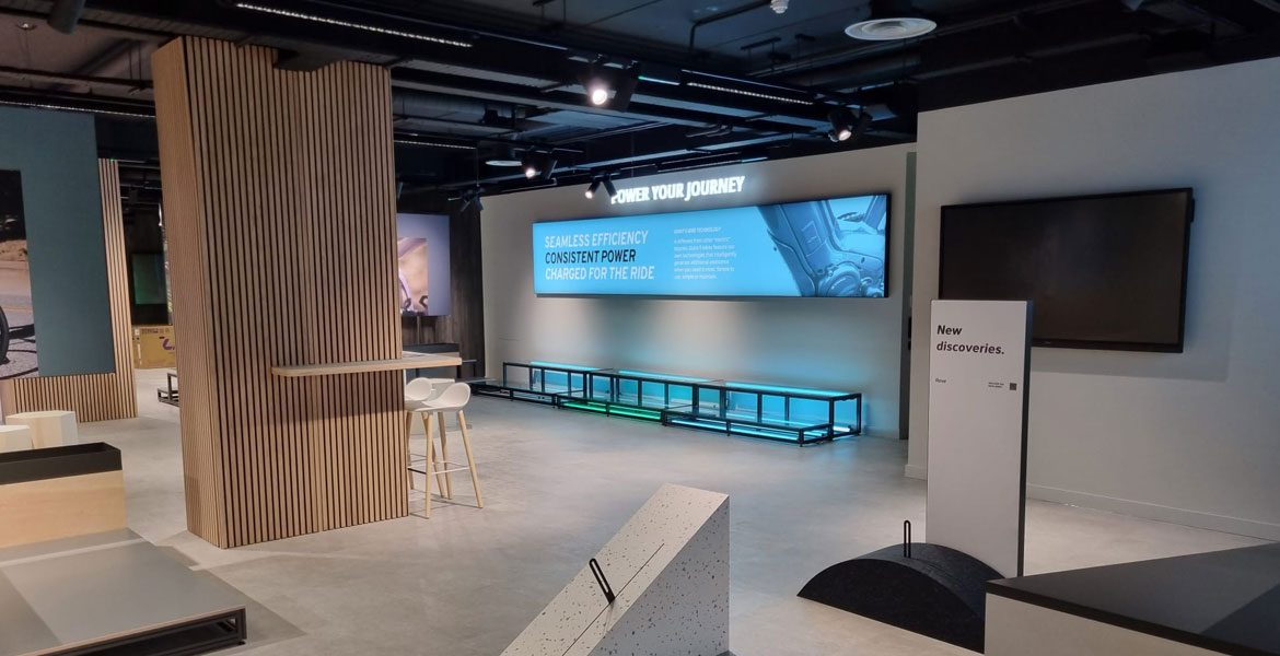 Digital display wall in bike showroom - Leicester fit out